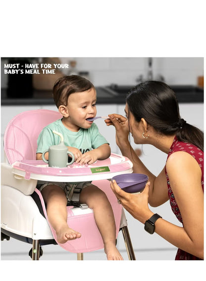 Happy Kiddo 4-in-1 Convertible High Chair for Kids – Features adjustable height and footrest to enhance toddler feeding; includes tray, wheels, safety harness, and cushion; suitable for ages 6 months to 4 years (Pink).