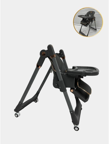 The Kidilo premium high chair features a luxurious, comfortable design suitable for mealtime. It comes equipped with a harness featuring multiple safety points and a cup holder, and boasts a sturdy, stable frame, distinctive wheels, and a seat (Black).