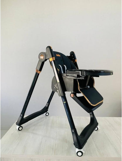 The Kidilo premium high chair features a luxurious, comfortable design suitable for mealtime. It comes equipped with a harness featuring multiple safety points and a cup holder, and boasts a sturdy, stable frame, distinctive wheels, and a seat (Black).