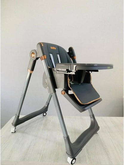 The Kidilo high chair features a modern design and an elegant gray color, providing comfort and safety for your child during mealtime. It is equipped with a comfortable, padded seat and a safety harness to keep the child secure (Gray).