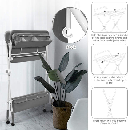 A foldable baby changing and dressing table, featuring storage baskets and side pockets, a spacious bottom shelf, and wheels for easy mobility—the ideal, practical solution for every mother to make baby care easier and more comfortable!