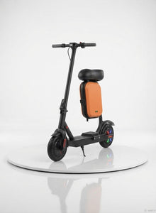 An innovative electric scooter for kids featuring a practical design, a comfortable seat, and a stylish orange storage box; it is equipped with light-up wheels for fun illumination and a modern look—from Happy Kiddo.