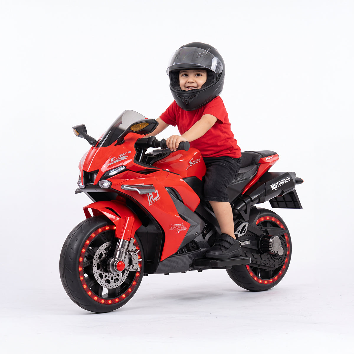The perfect gift for playtime: a red electric motorcycle for kids from Happy Kiddo, featuring headlights, dazzling lights, and a stylish helmet.